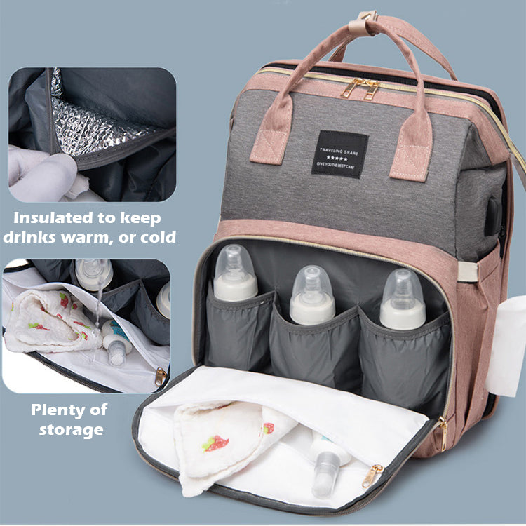 Baby diaper bag with changing station